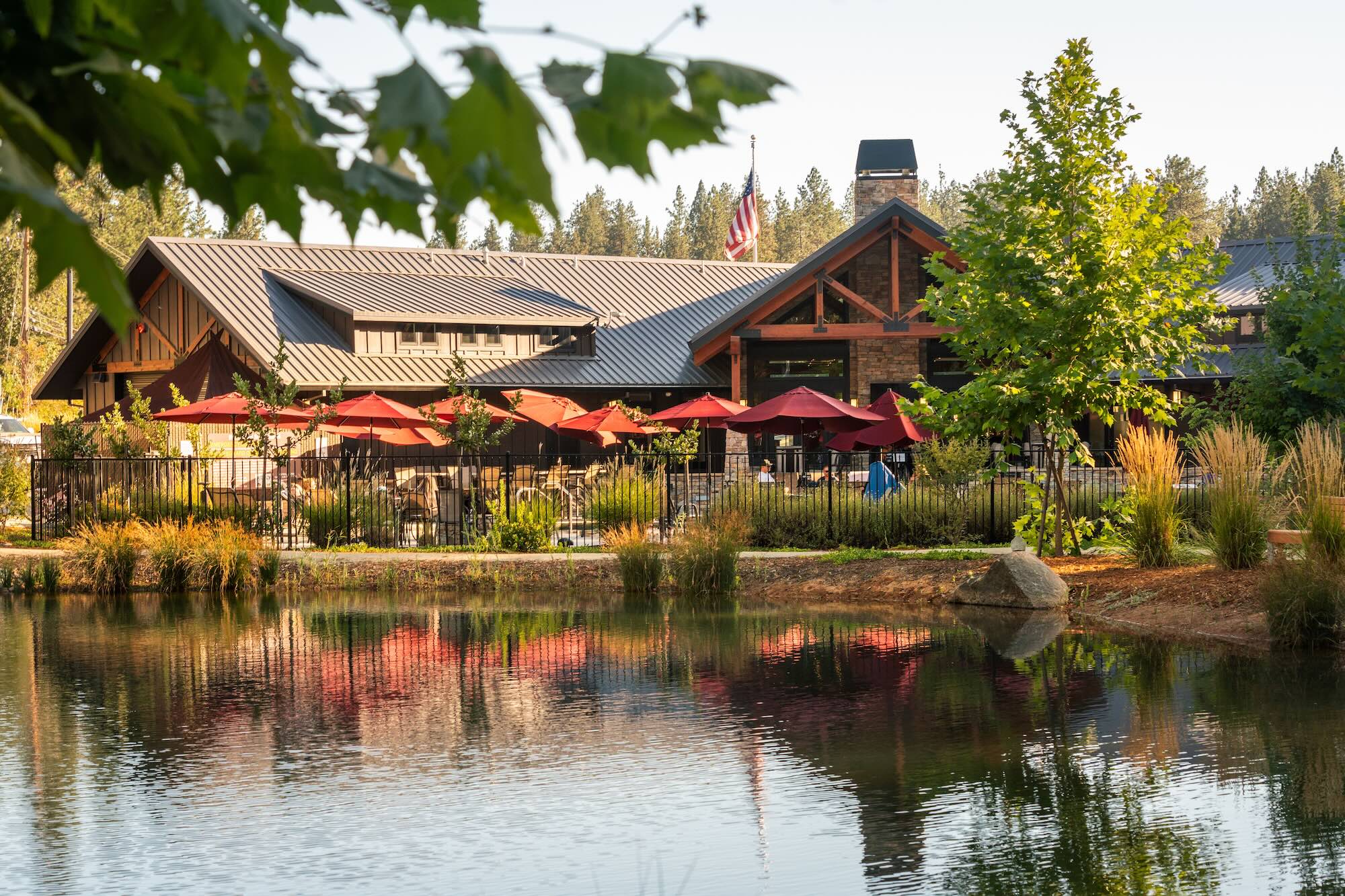 Grass Valley RV Resort lodge surrounded by mature trees