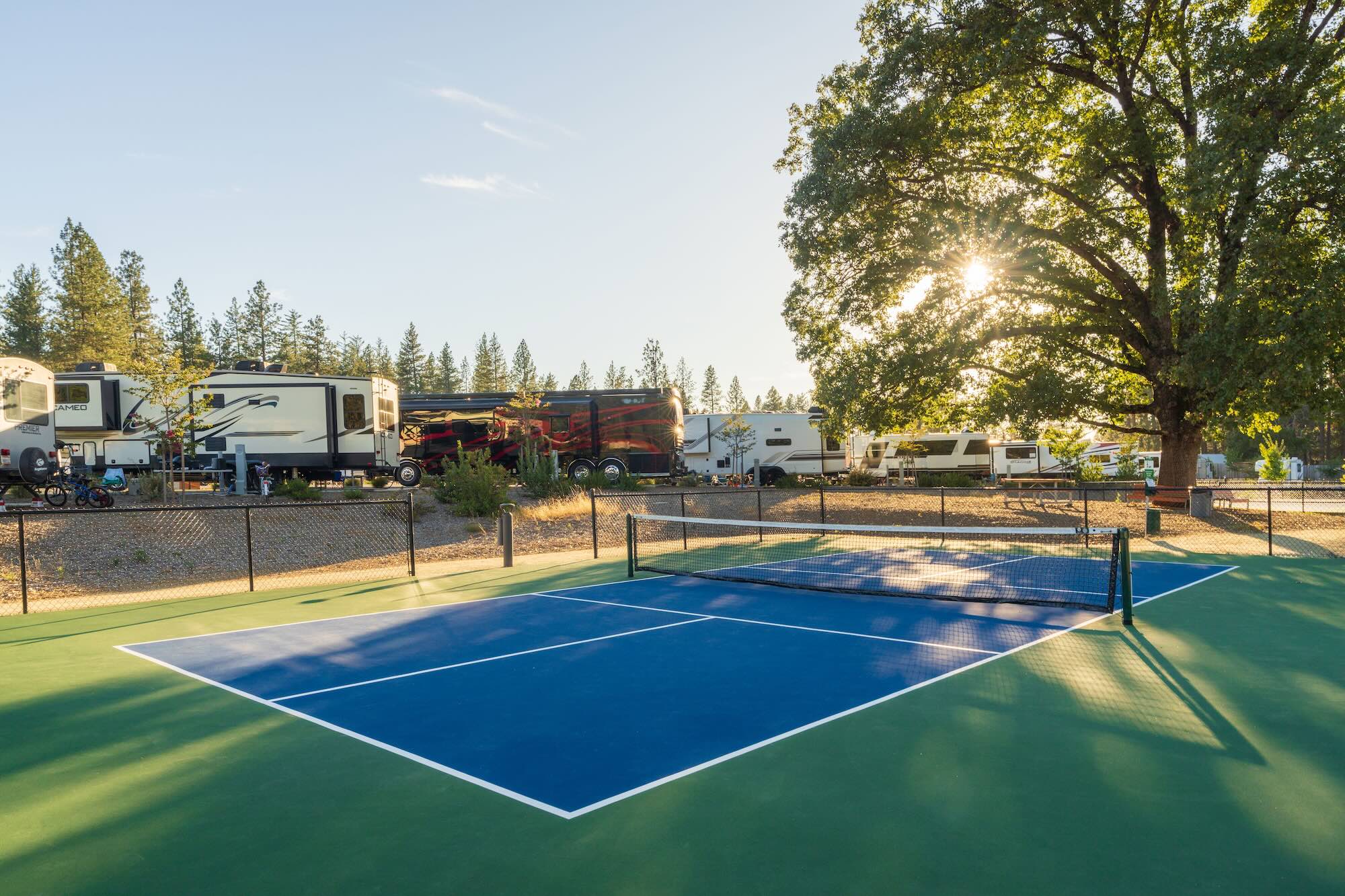 Pickleball court under the pines at Grass Valley RV Resort
